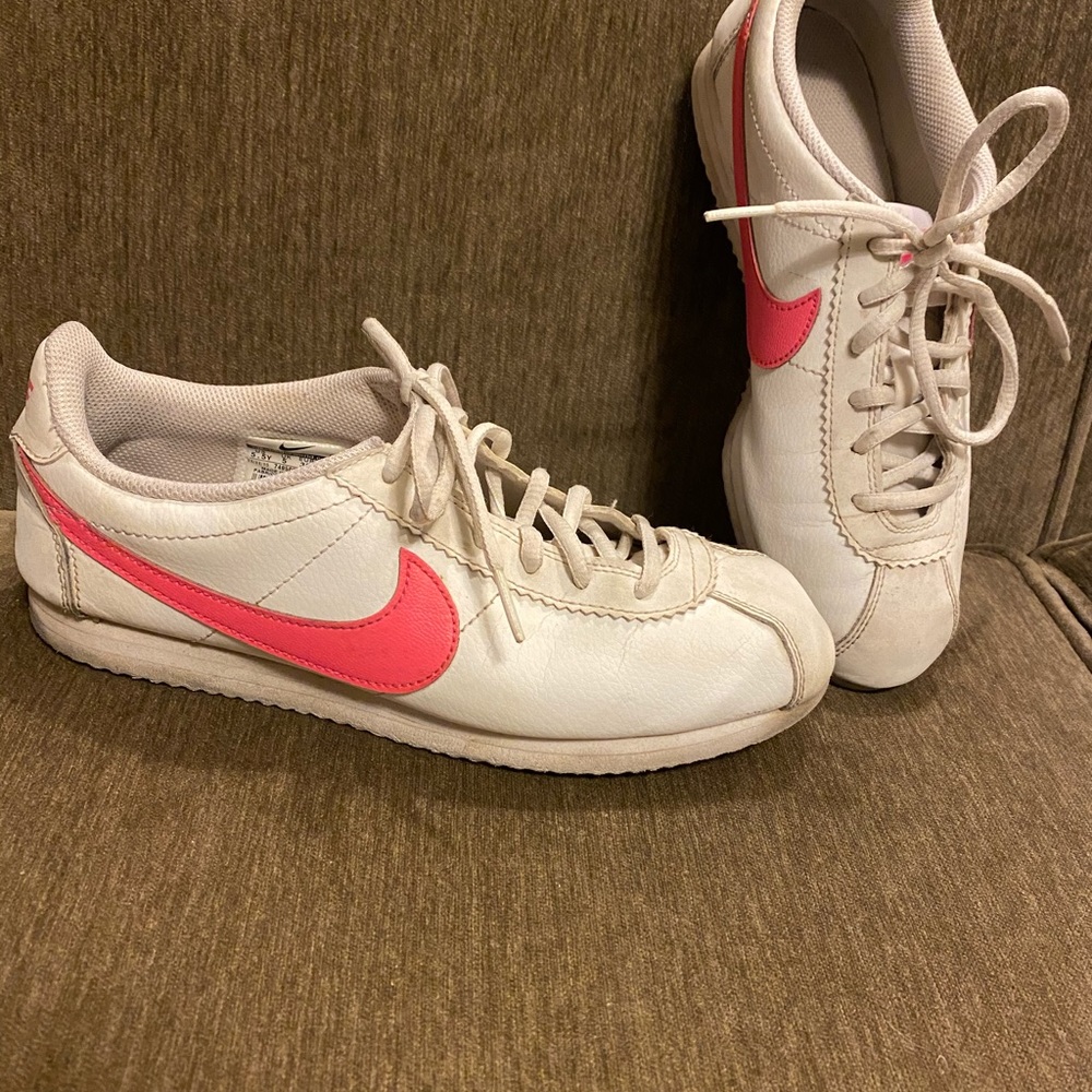 Nike Cortez hot pink swoosh.